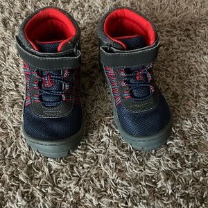 Gray, red, navy boot.